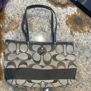 Coach Brown Tote Bag with Geometric Design and Leather Straps